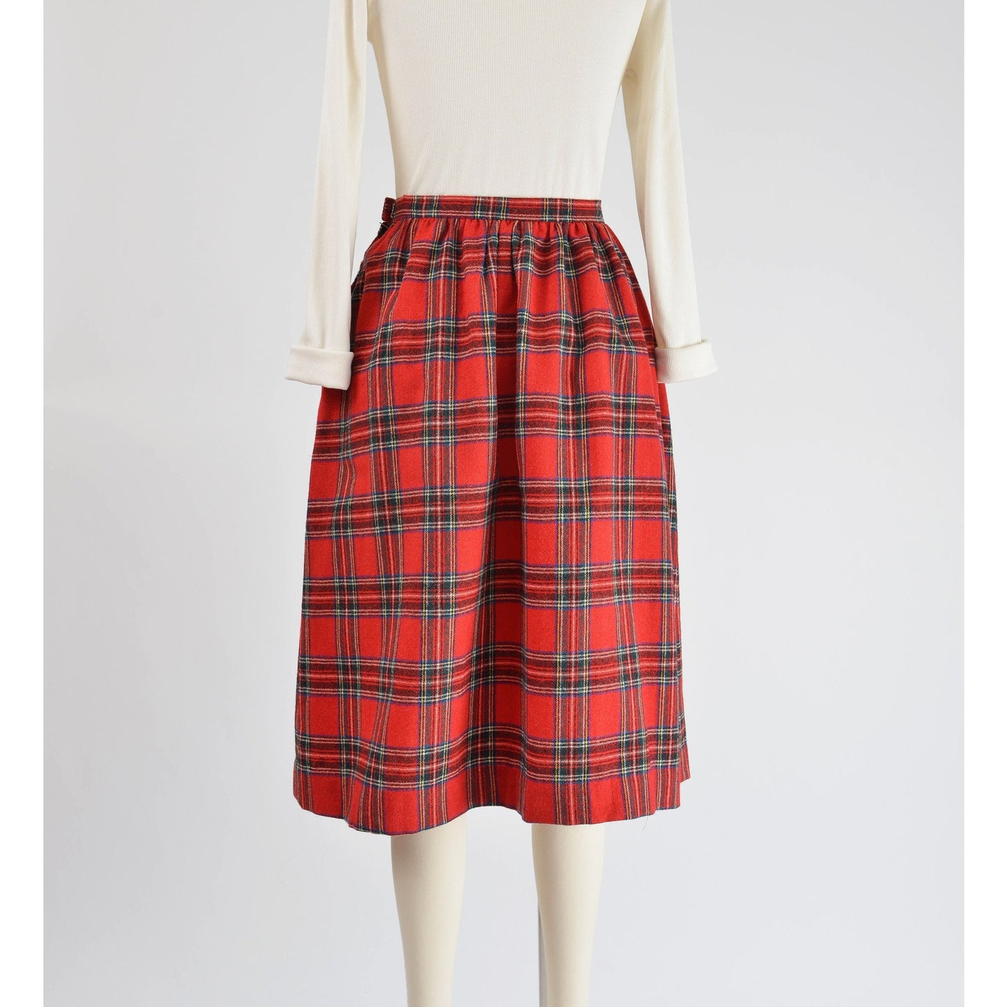 Front view of Vintage 1970s red tartan plaid full wool midi skirt.