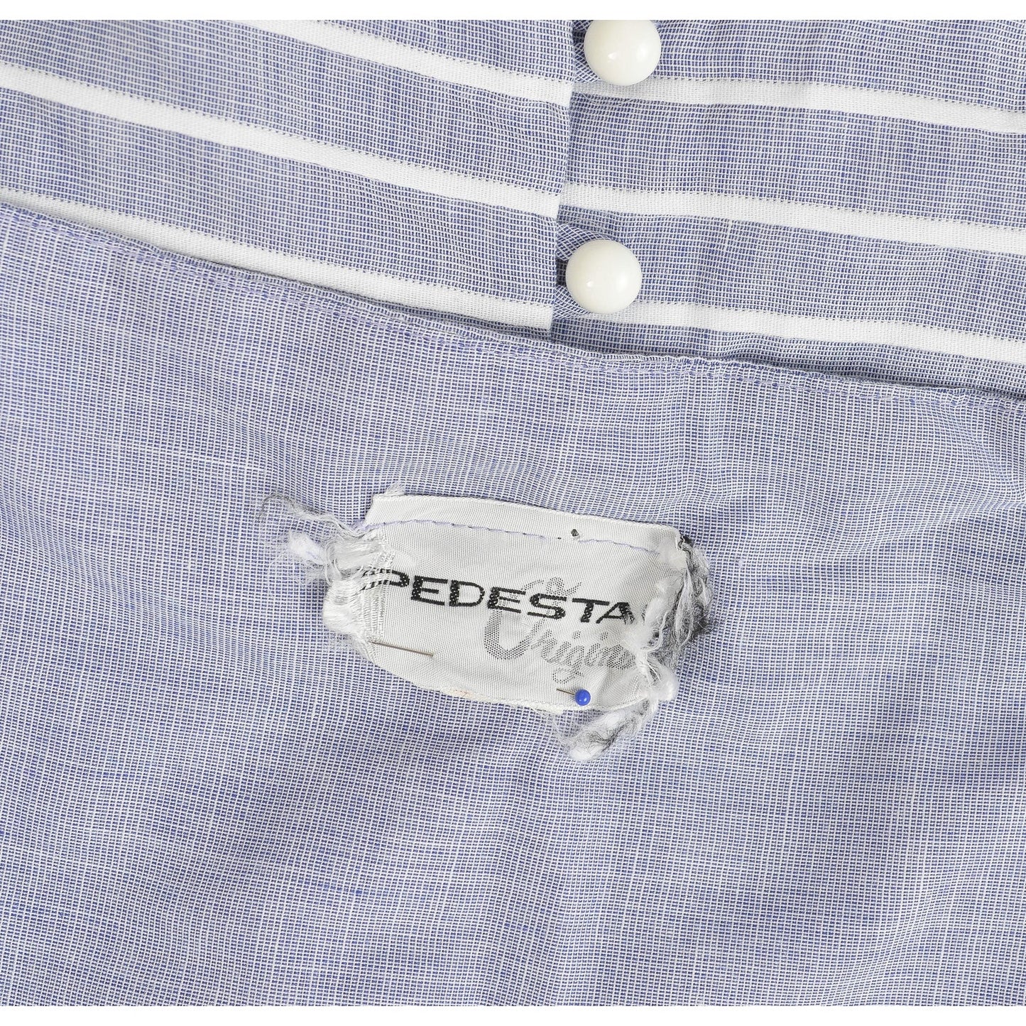 Pedestal label inside of vintage dress.