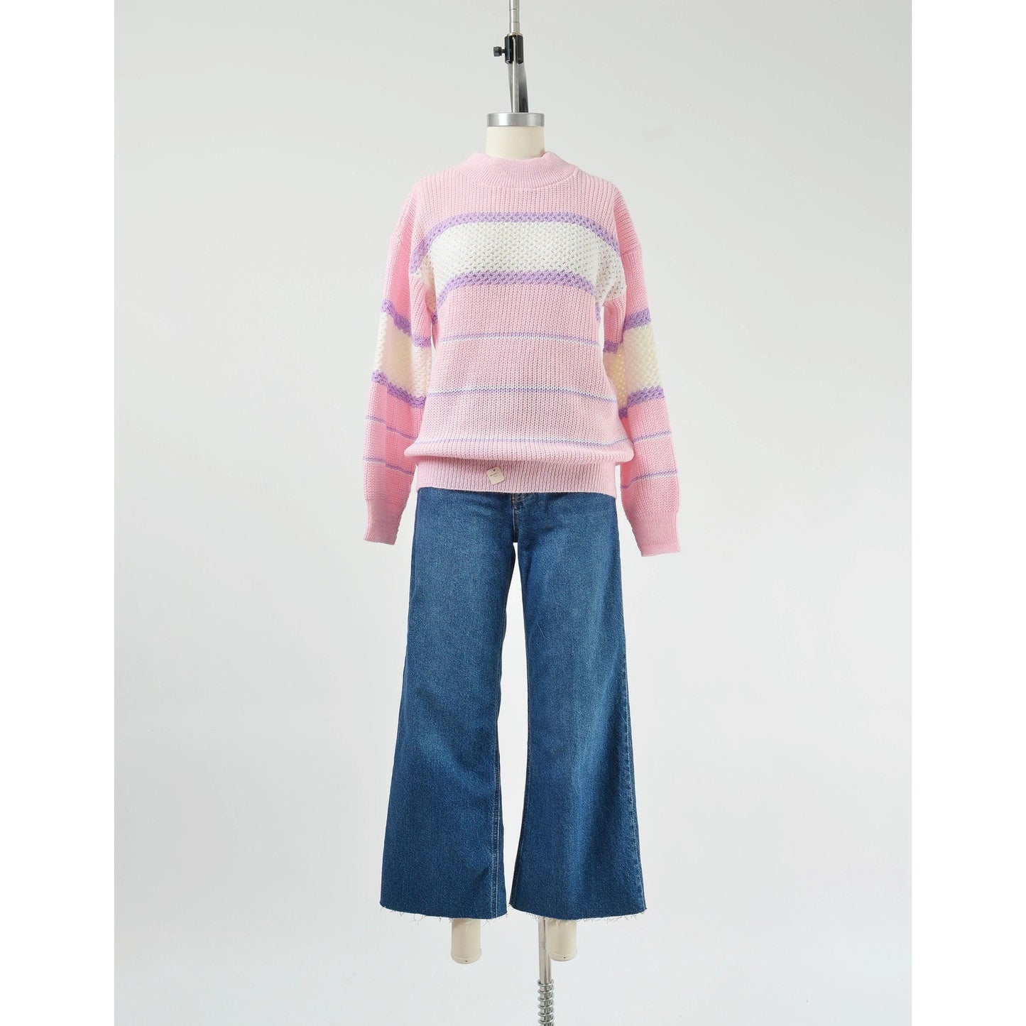 Vintage 80s pink, white, and purple striped sweater with mock neck and slouchy fit.