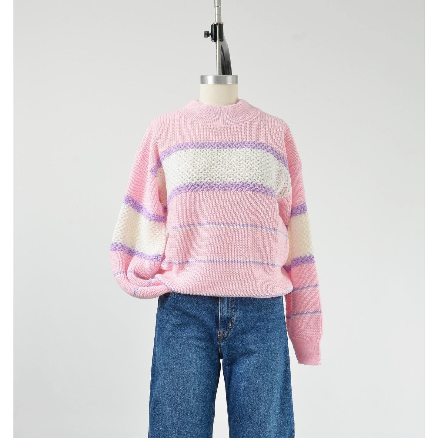 Vintage 1980s pink, white, and purple striped sweater with mock neck and slouchy fit.