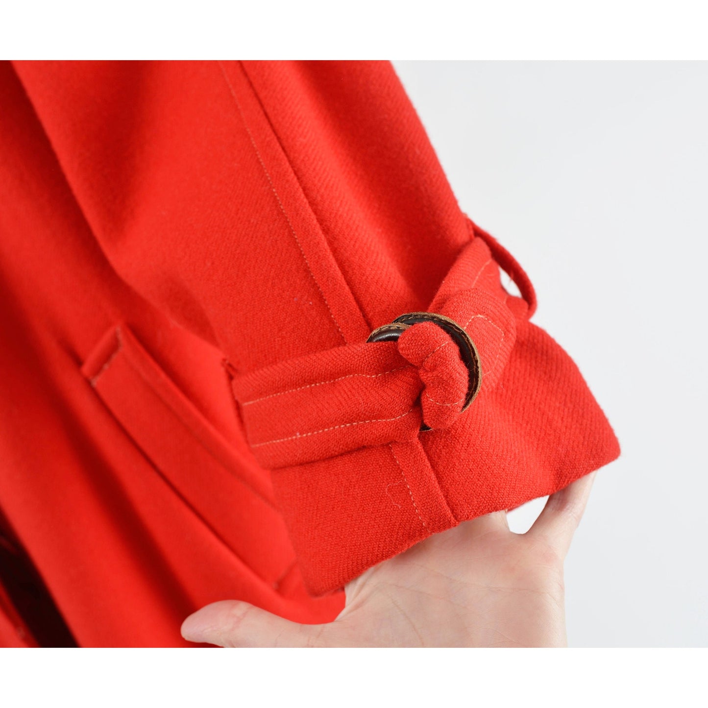 Cuff view up close on vintage 80s red wool long full length winter coat.