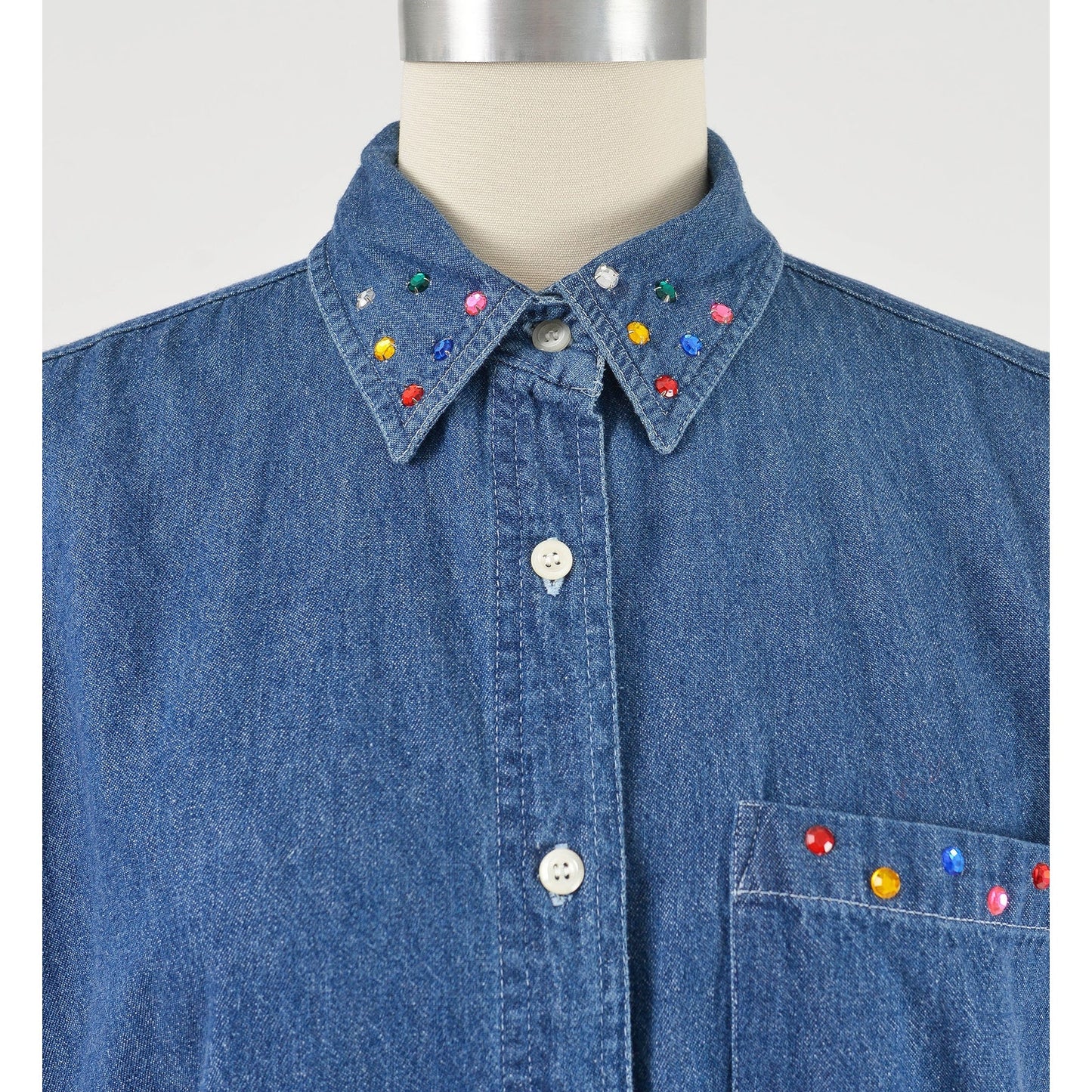 vintage 1990s denim cotton sleeveless collared shirt with rhinestones. Collar view.