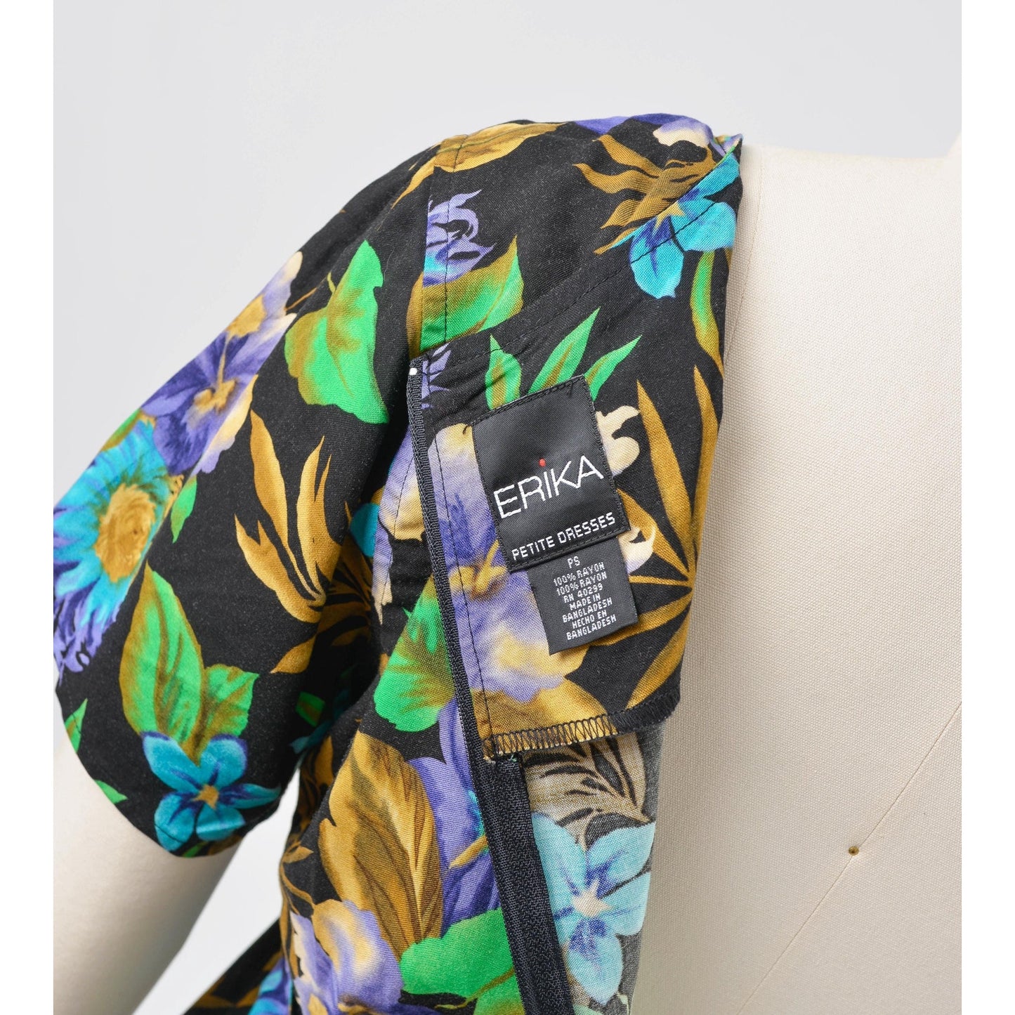 Floral-patterned garment with Erika label on a white background