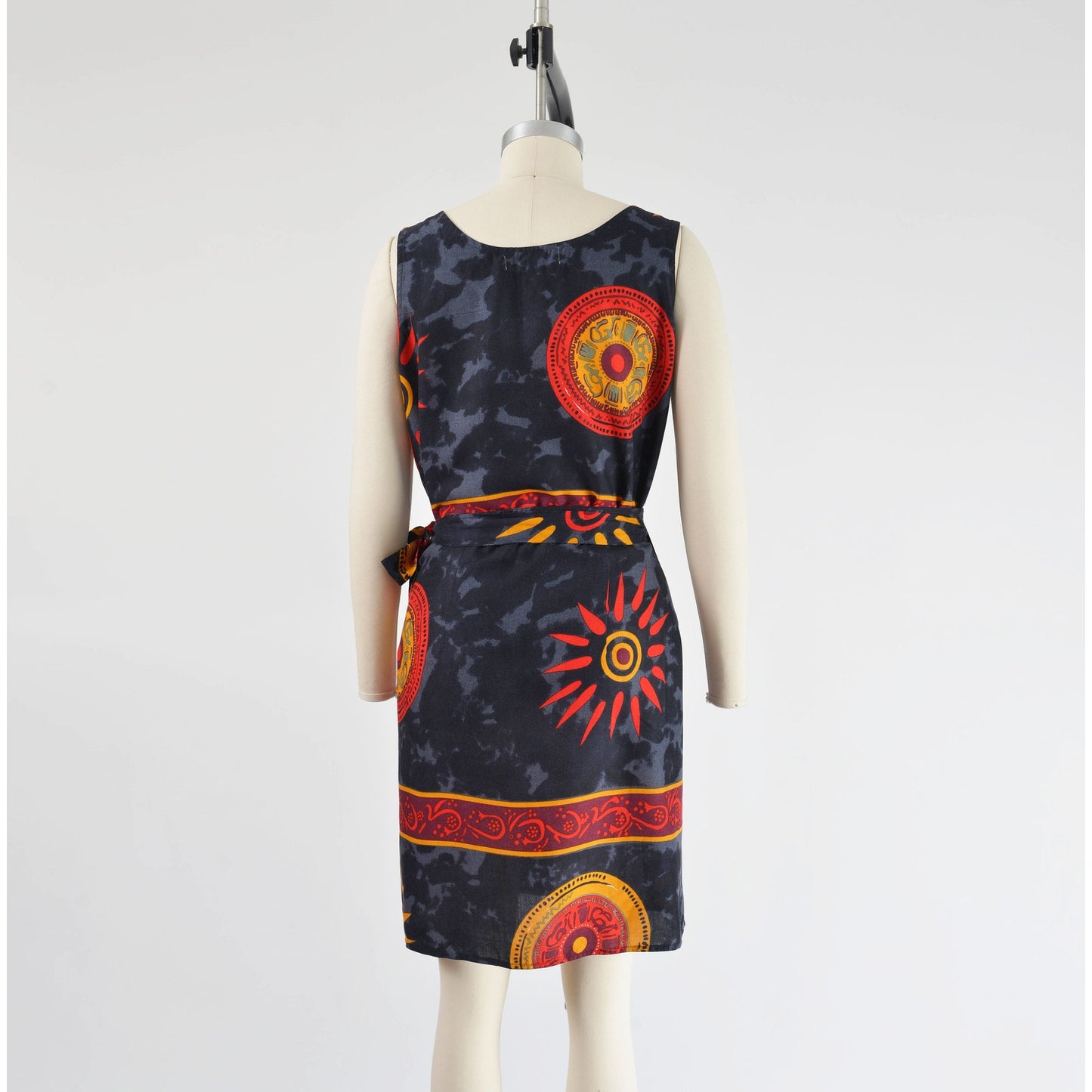 Back view of vintage 90s ethnic Thai tank top and wrap around skirt two piece set.