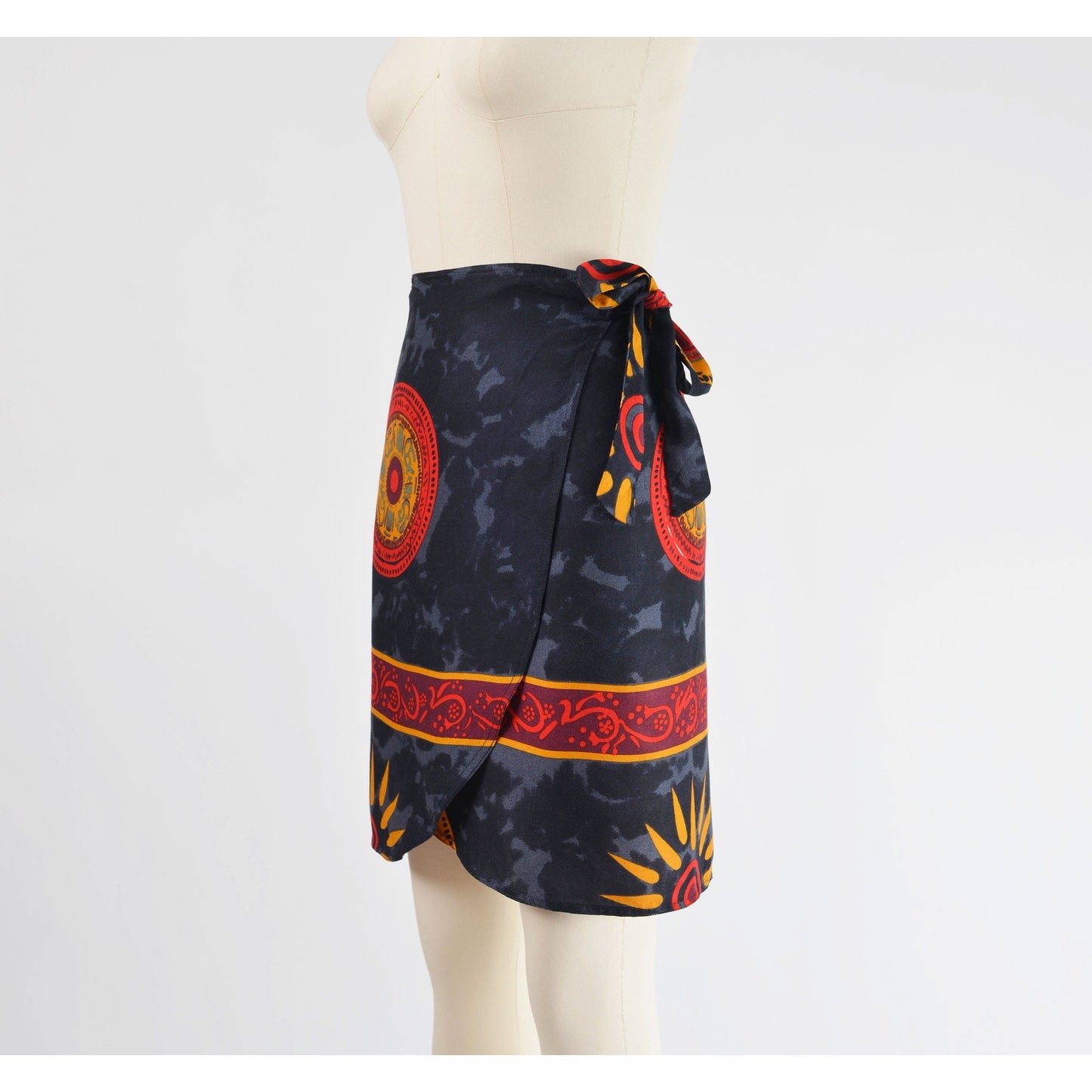 Side view of skirt on vintage 90s ethnic Thai tank top and wrap around skirt two piece set.