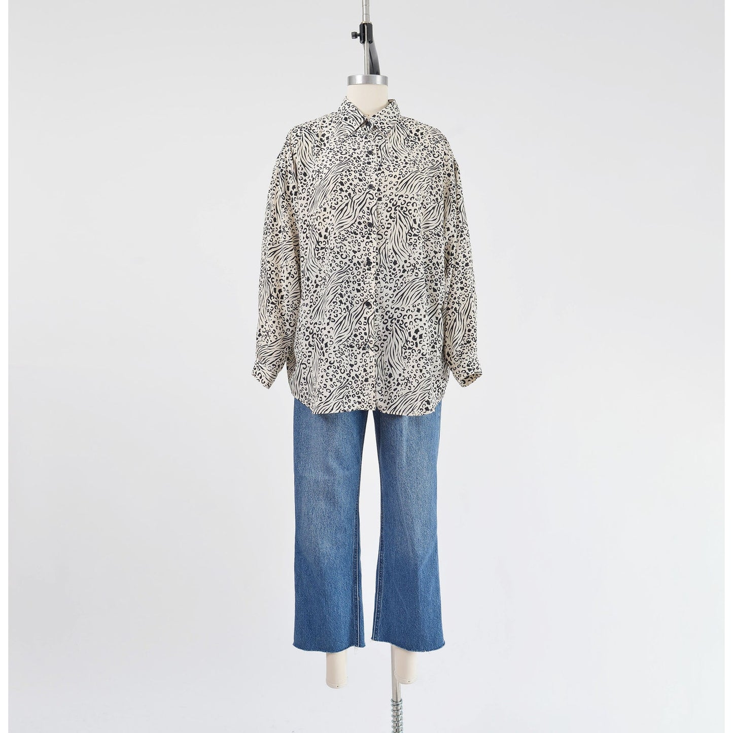 Vintage 1990s black and white leopard animal print button down blouse.