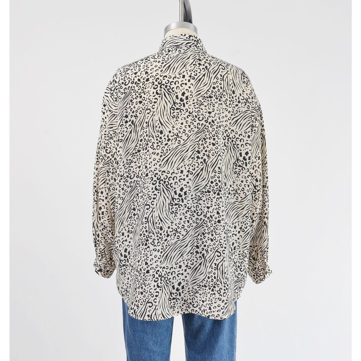 Vintage 1990s black and white leopard animal print button down blouse.