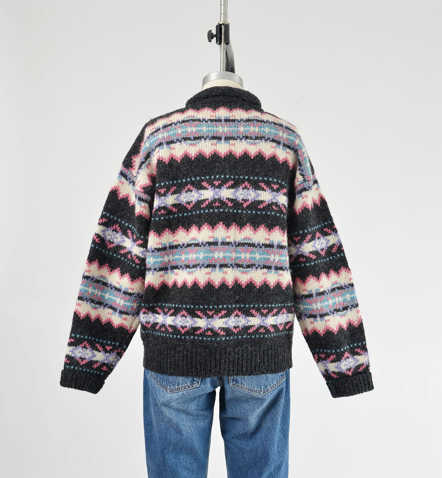 Black view of vintage Woolrich striped sweater.