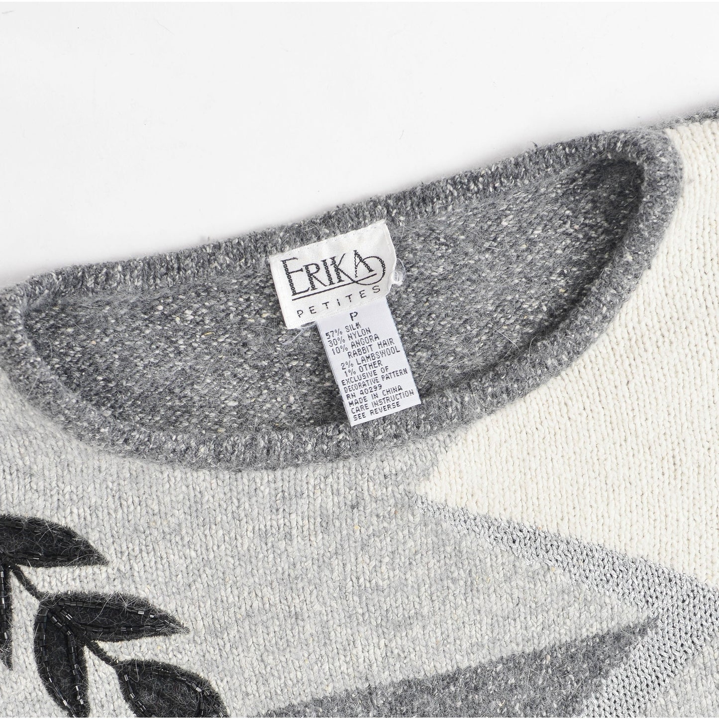 Vintage gray and black color block beaded leaf sweater. Silk, angora, and lambswool knit.