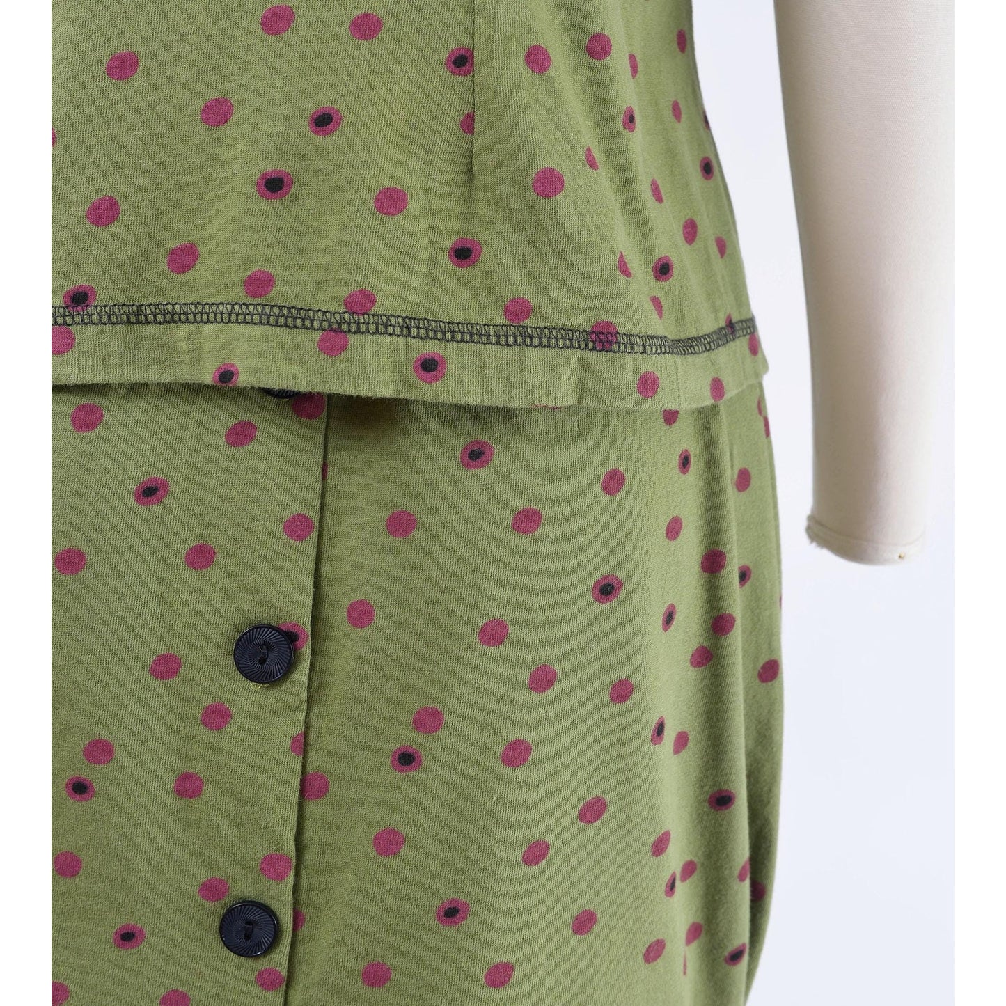 Close up view of Vintage 1990s green polka dot sailor collar top and pencil skirt set.