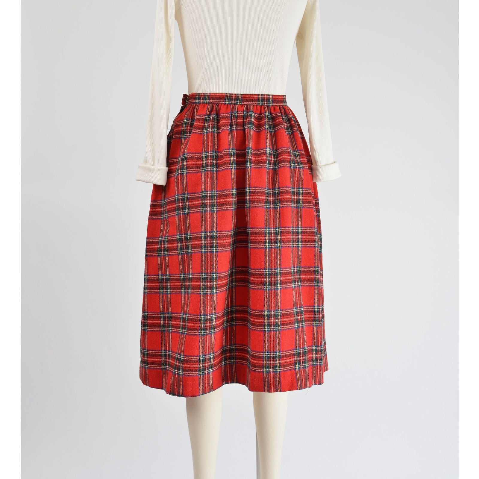 Front view of Vintage 1970s red tartan plaid full wool midi skirt. 