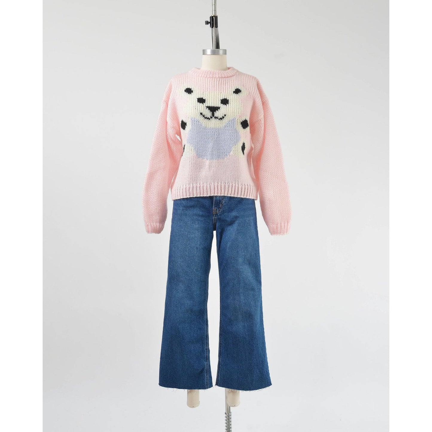 Vintage 1980s kawaii pink teddy bear sweater. Chunky acrylic knit. Full front view.