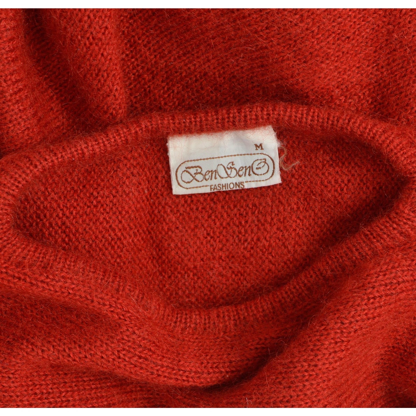 Label inside of red mohair sweater neckline. 