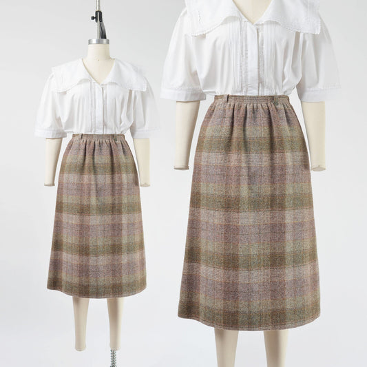 vintage 1970s brown plaid wool midi skirt with pockets. 
