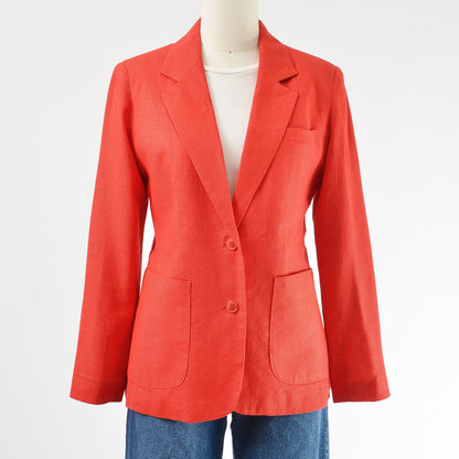 Vintage 1970s red linen and rayon blend blazer. Fitted silhouette. Two button closures with large hip pockets. 