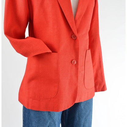 Vintage 1970s red linen and rayon blend blazer. Fitted silhouette. Two button closures with large hip pockets. 