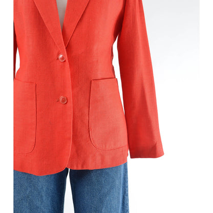 Vintage 1970s red linen and rayon blend blazer. Fitted silhouette. Two button closures with large hip pockets. 