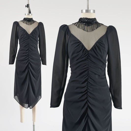 Vintage 80s black dress with beaded sheer neckline.