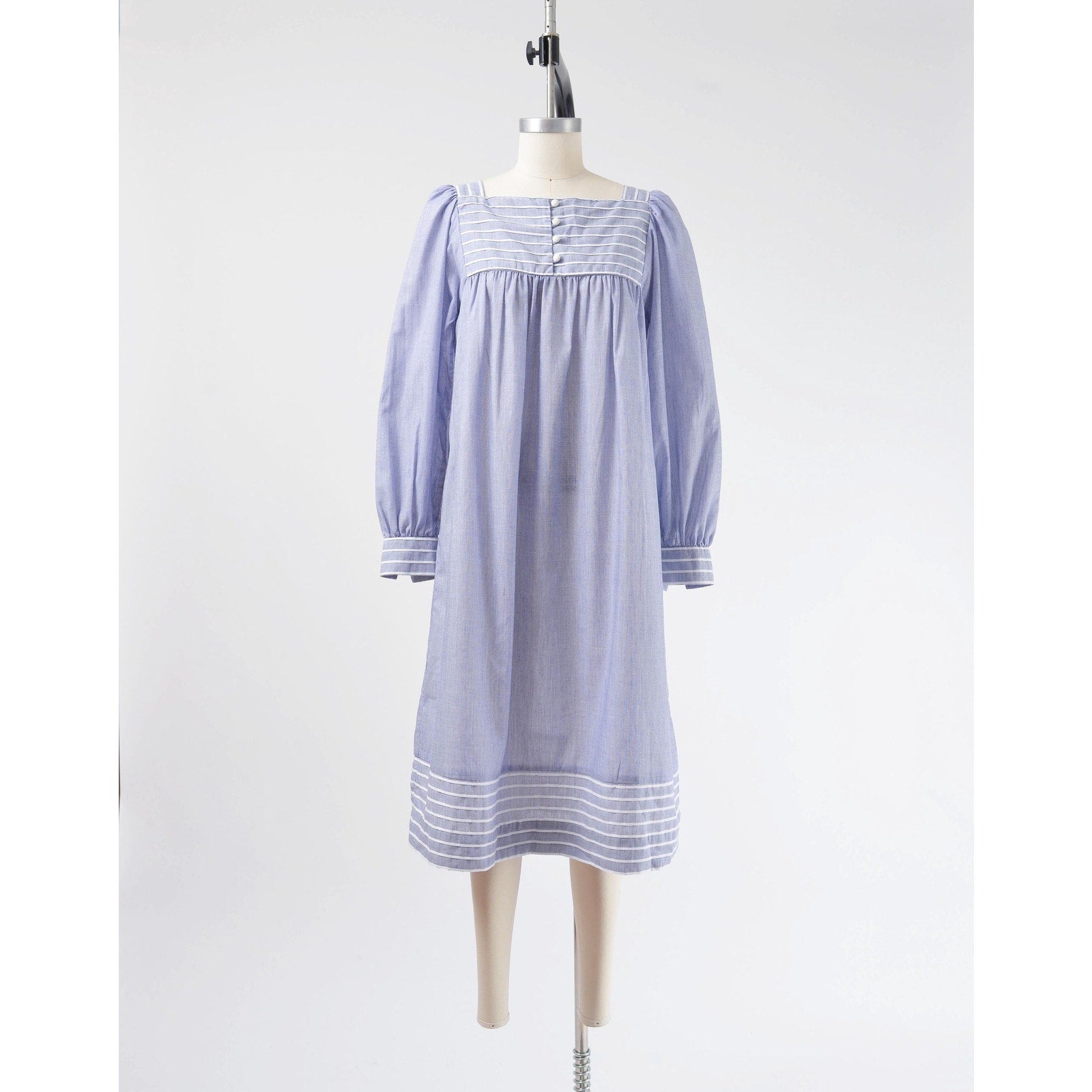 Full front view of Vintage 80s blue and white striped cotton tent dress with puff sleeves.