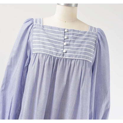 View of neckline on 80s blue and white striped cotton tent dress with puff sleeves. Front view. 