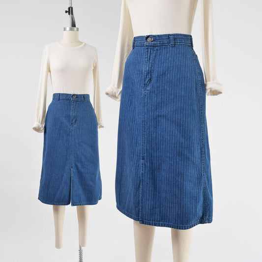 Vintage 1980s high-waisted denim pinstripe skirt. Midi length pencil fit with slit. 