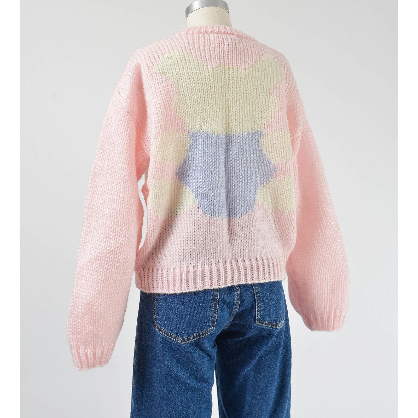 Back view of Vintage 1980s kawaii pink teddy bear sweater. Chunky acrylic knit. 