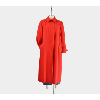 Full front view buttoned up of vintage 80s red wool long full length winter coat. 