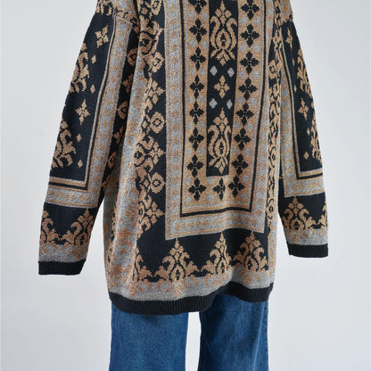 Vintage 90s black metallic baroque oversized pullover sweater. Hemline view.