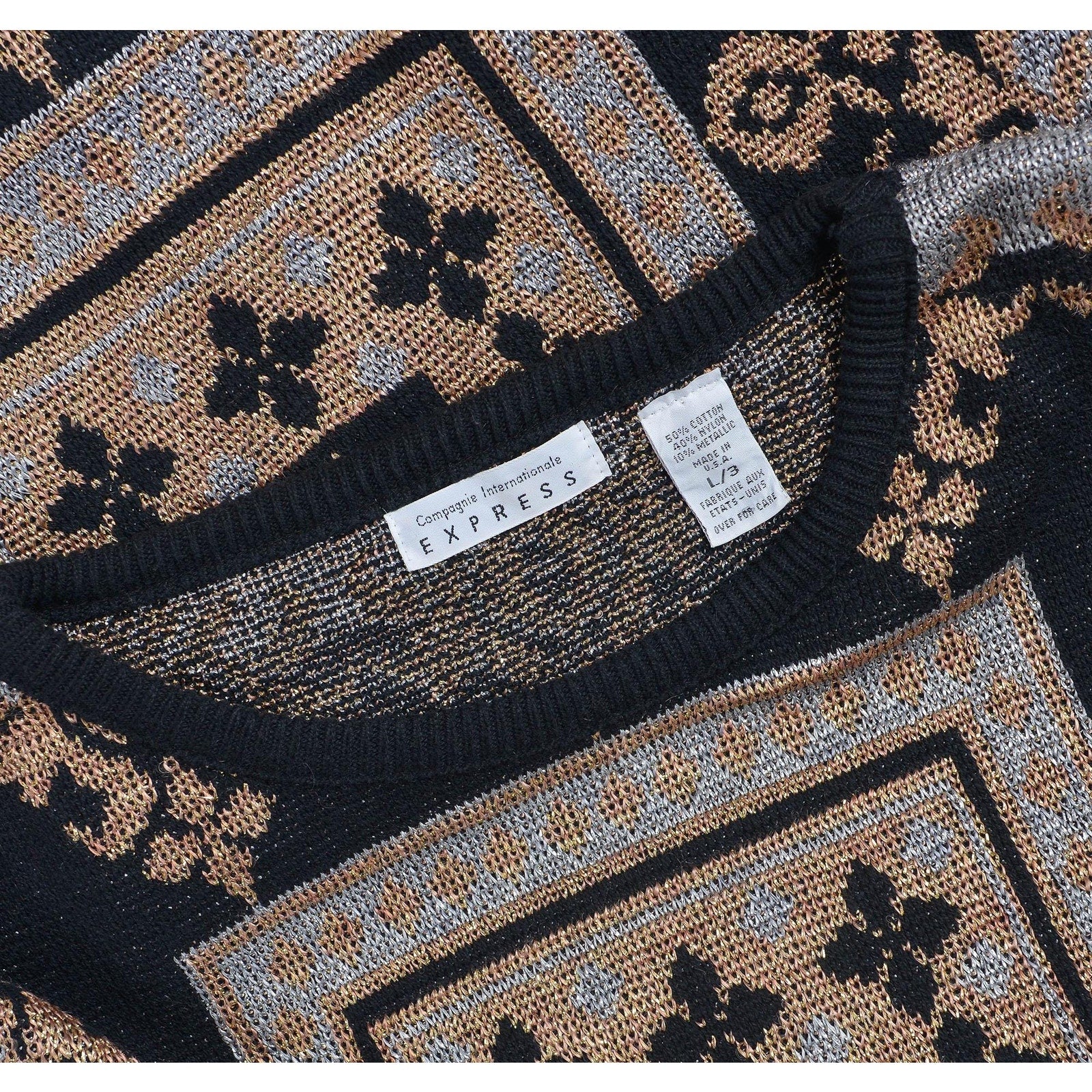 Vintage 90s black metallic baroque oversized pullover sweater. Label view.