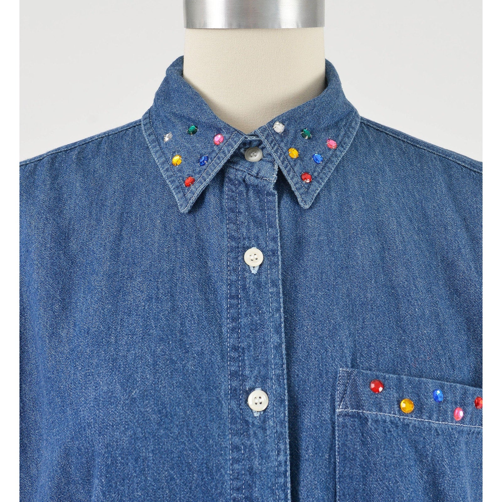 vintage 1990s denim cotton sleeveless collared shirt with rhinestones. Collar view.