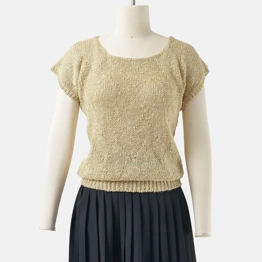 Front view of a 90s vintage tan zig zag striped short sleeve sweater. 