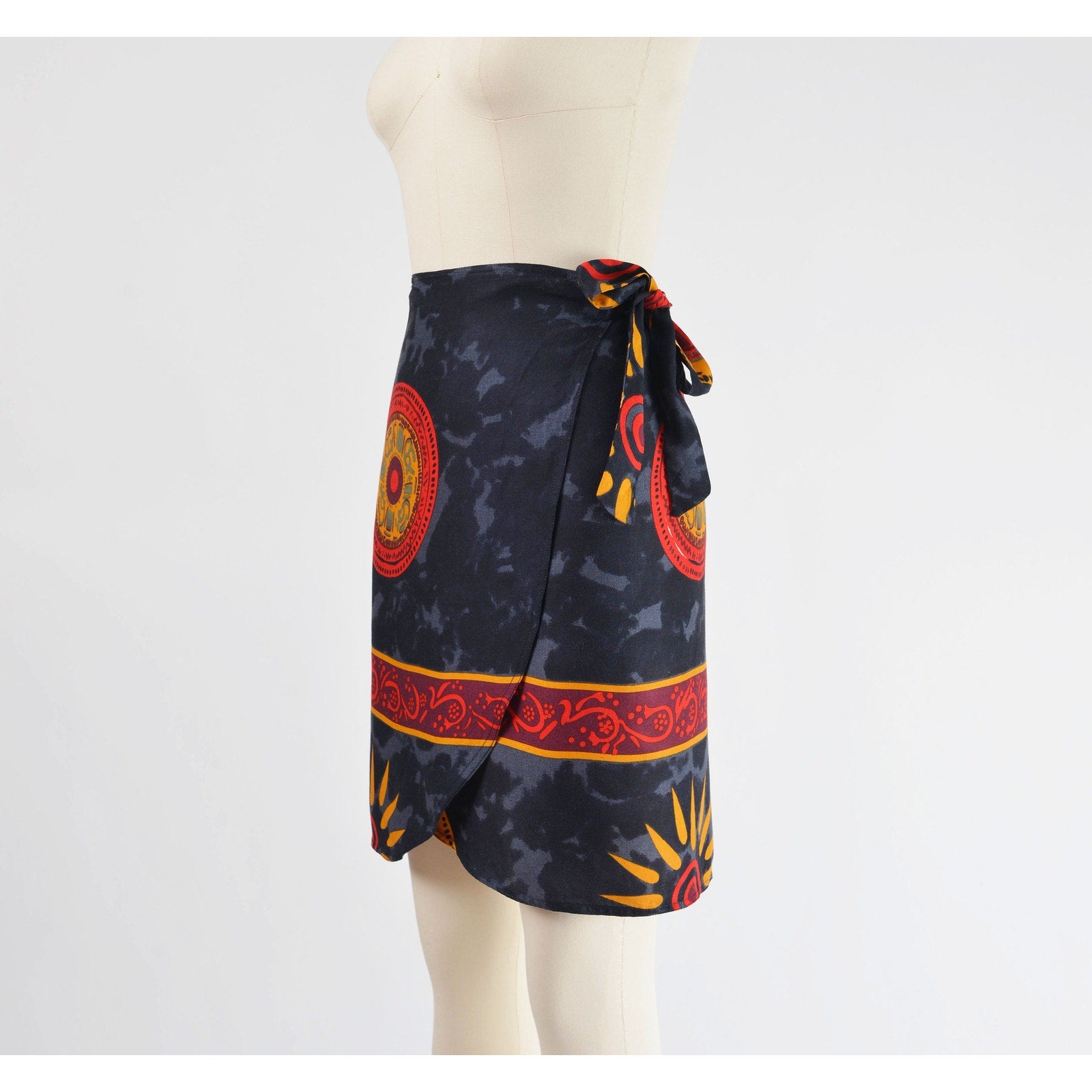 Side view of skirt on vintage 90s ethnic Thai tank top and wrap around skirt two piece set. 