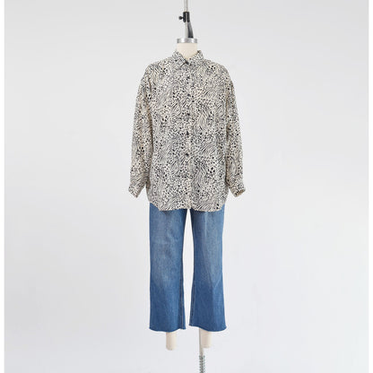 Vintage 1990s black and white leopard animal print button down blouse. 
