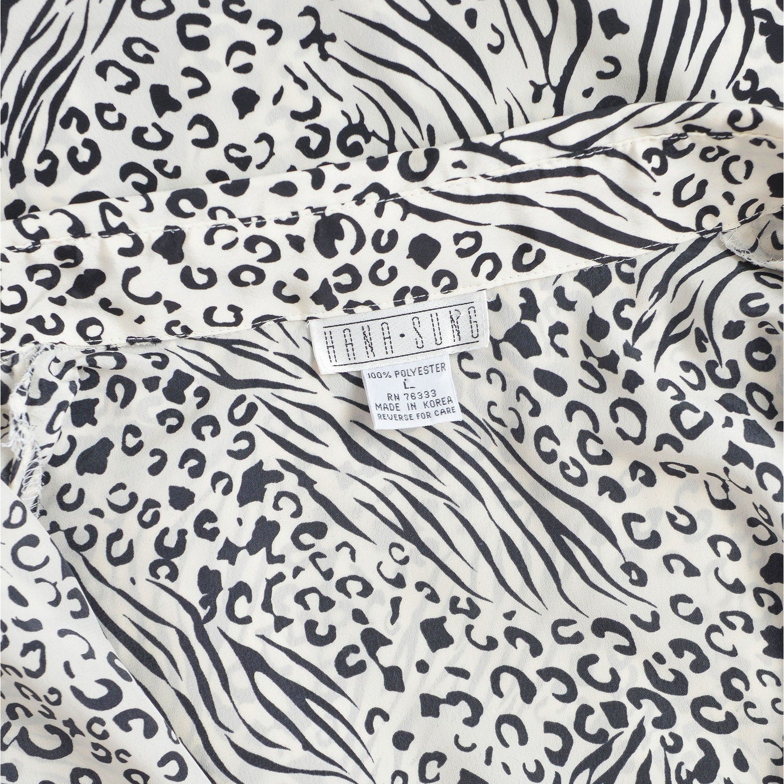 Vintage 1990s black and white leopard animal print button down blouse. 
