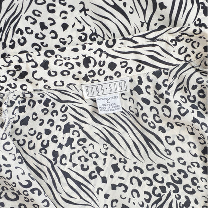 Vintage 1990s black and white leopard animal print button down blouse. 