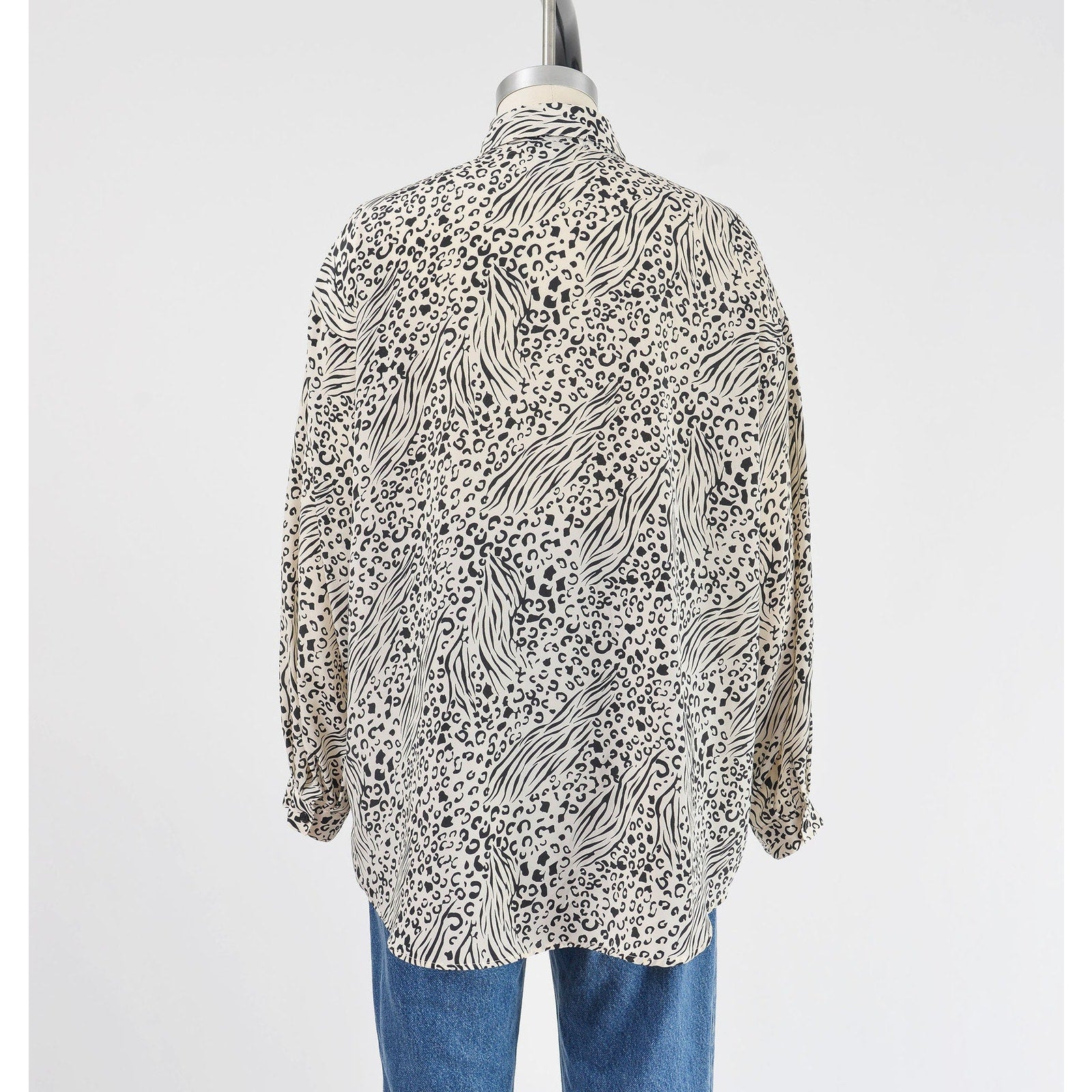 Vintage 1990s black and white leopard animal print button down blouse. 