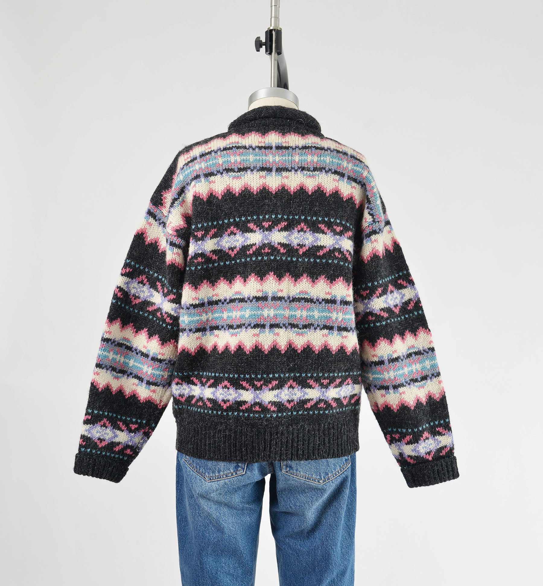 Black view of vintage Woolrich striped sweater.