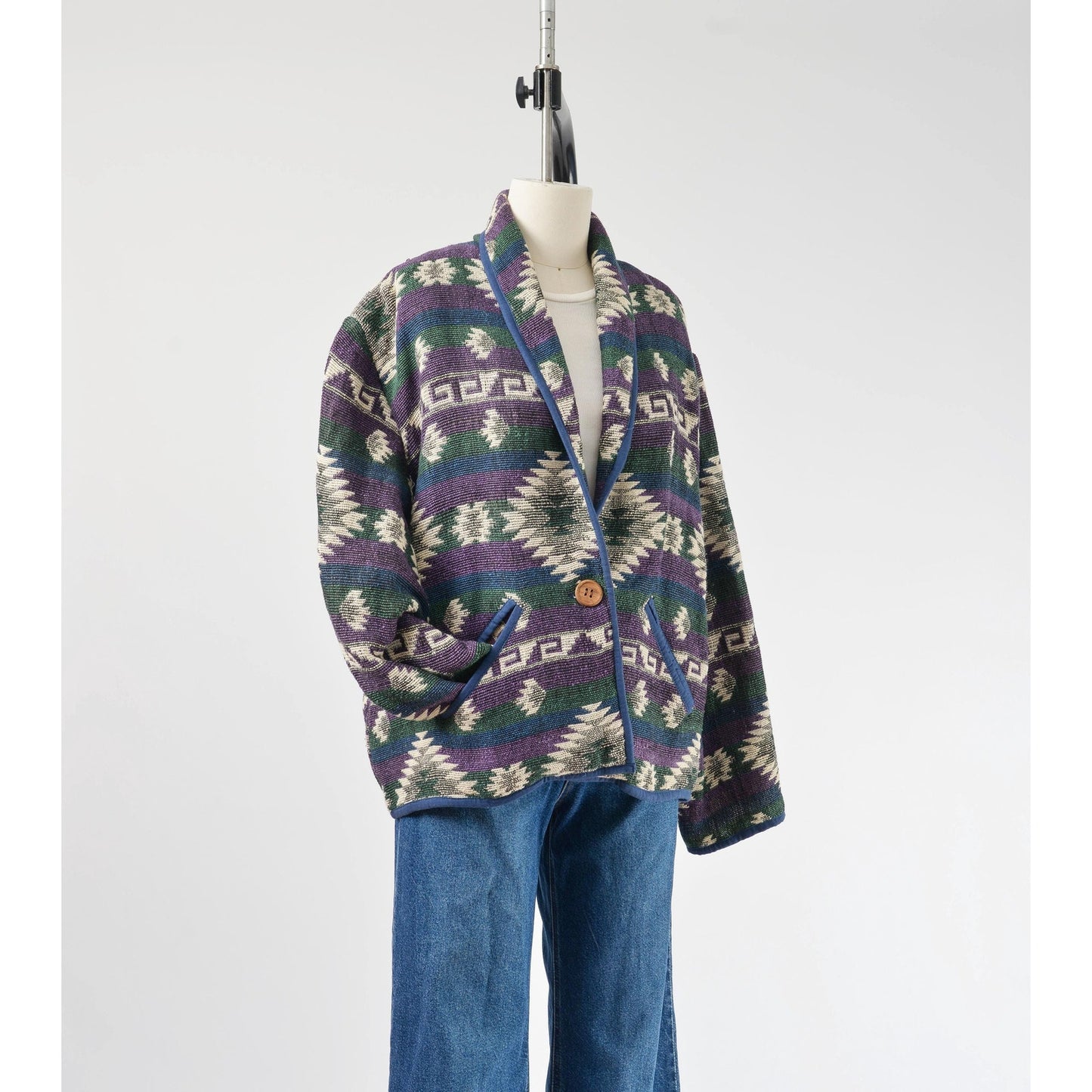 Side view of 90s woven southwestern jacket. 