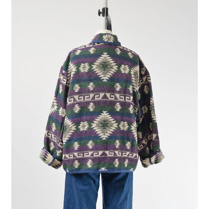 Back view of woven southwestern jacket.